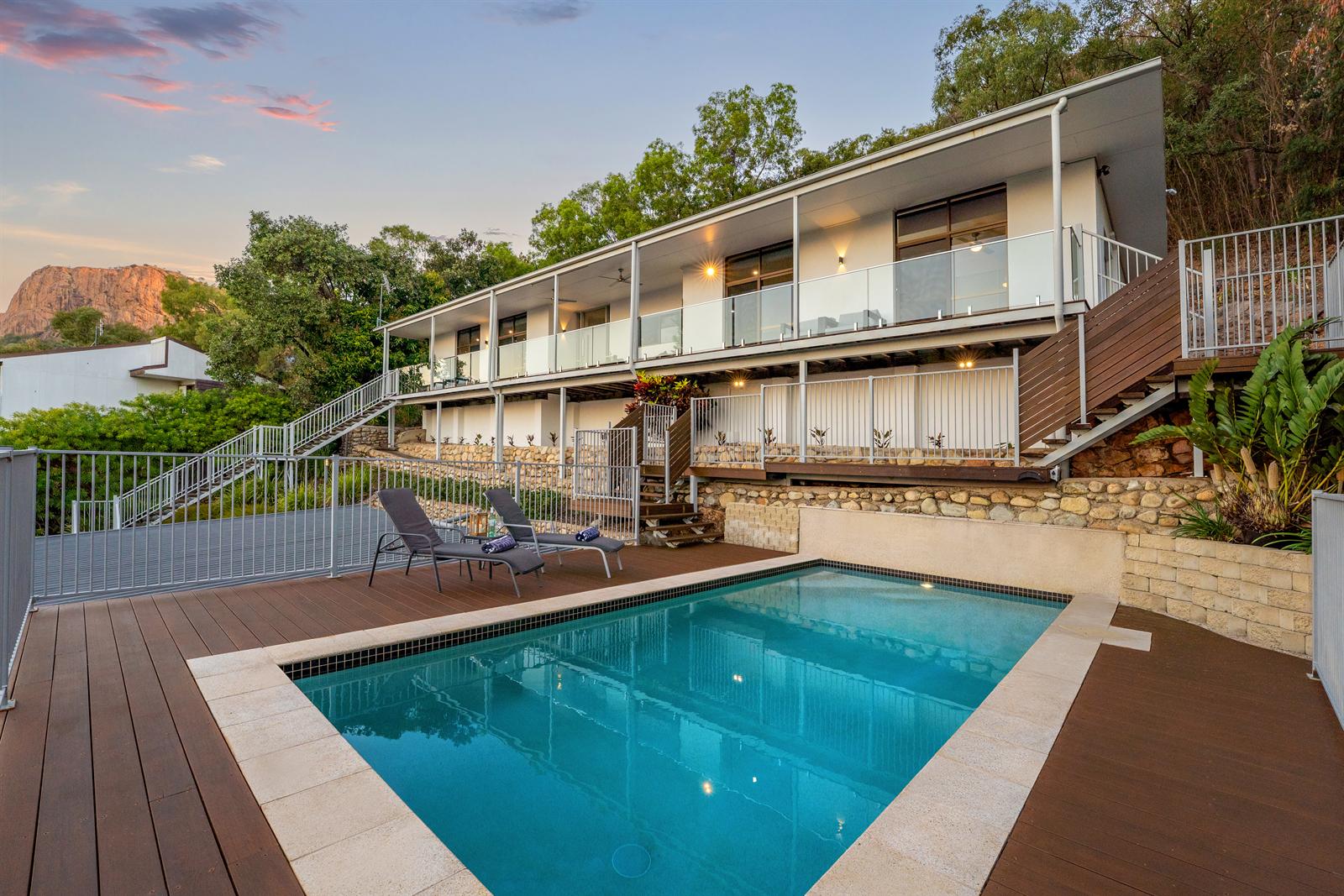 Pool and deck below the residence